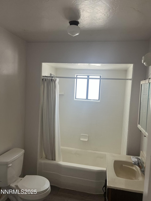 1470 Franklin Ave, Lovelock, NV 89419 - full bath with shower / bath combo with shower curtain, vanity, and wood finished floors