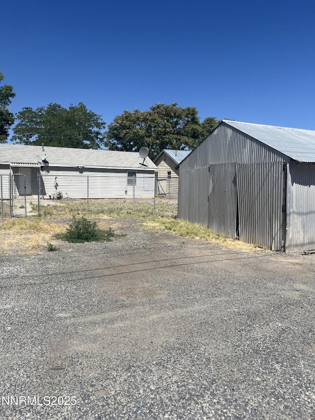 1470 Franklin Ave, Lovelock, NV 89419 - view of yard featuring an outdoor structure and an outbuilding