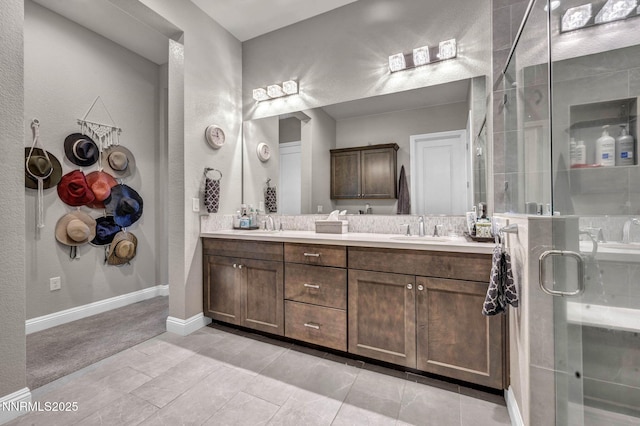 2109 Cast Iron Dr, Reno, NV 89521 - full bathroom featuring double vanity, a shower stall, and a textured wall
