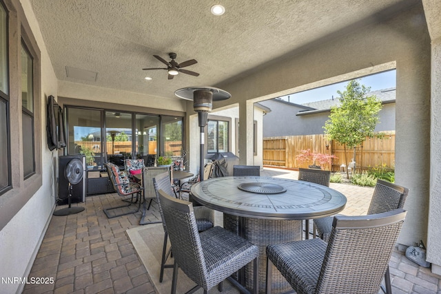 2109 Cast Iron Dr, Reno, NV 89521 - view of patio featuring outdoor dining space, a ceiling fan, and a grill