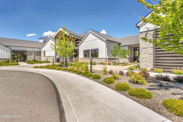 2109 Cast Iron Dr, Reno, NV 89521 - view of front facade with stone siding and board and batten siding