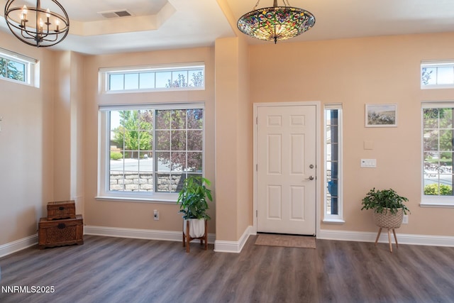 2605 Lerma Ct, Sparks, NV 89436 - foyer featuring wood finished floors, a chandelier, and plenty of natural light