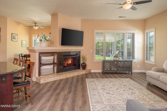 2605 Lerma Ct, Sparks, NV 89436 - living room with a ceiling fan, wood finished floors, and healthy amount of natural light