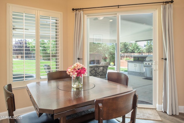 2605 Lerma Ct, Sparks, NV 89436 - dining space featuring baseboards and wood finished floors
