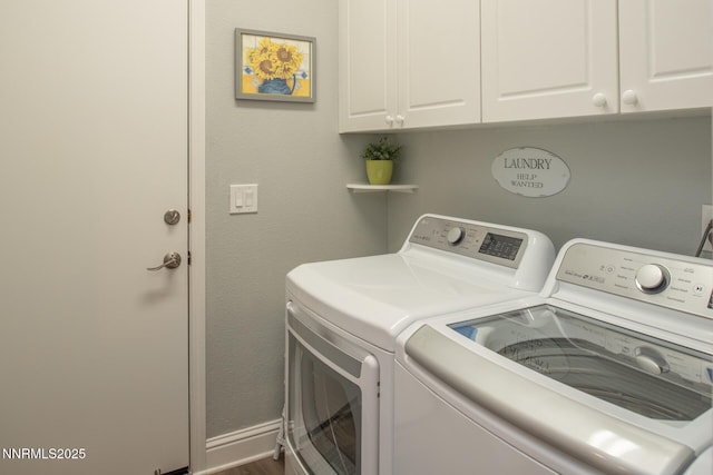 2605 Lerma Ct, Sparks, NV 89436 - laundry room with cabinet space, independent washer and dryer, and dark wood finished floors