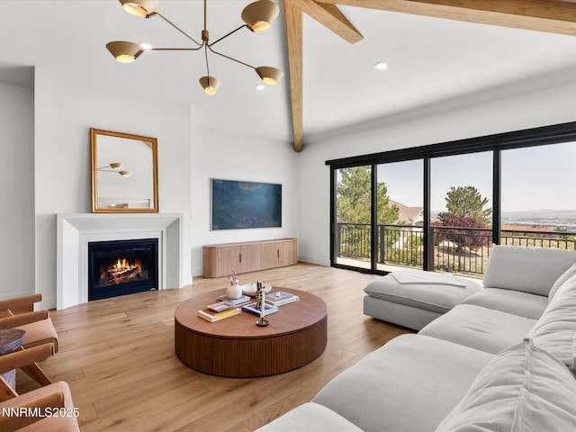 3662 Spirit Bluff Ct, Reno, NV 89511 - living area featuring a glass covered fireplace, wood finished floors, and recessed lighting