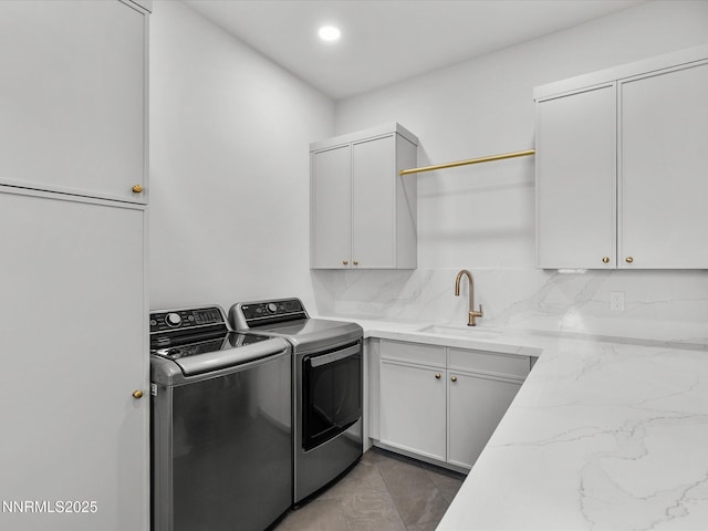 3662 Spirit Bluff Ct, Reno, NV 89511 - washroom with washer and clothes dryer, cabinet space, and recessed lighting
