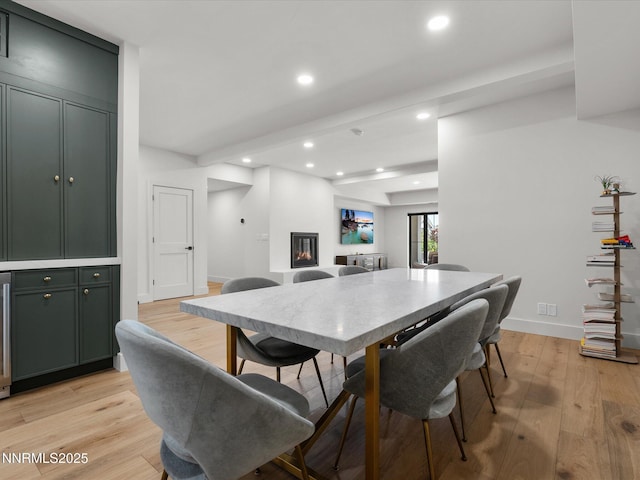 3662 Spirit Bluff Ct, Reno, NV 89511 - dining space with light wood finished floors, recessed lighting, and beverage cooler