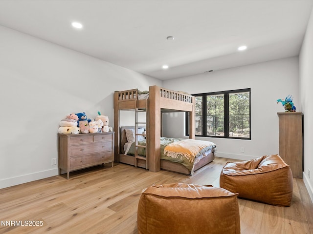 3662 Spirit Bluff Ct, Reno, NV 89511 - bedroom with wood finished floors and recessed lighting