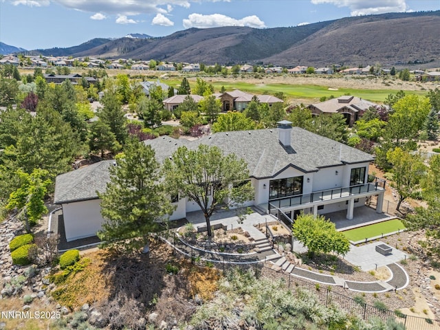 3662 Spirit Bluff Ct, Reno, NV 89511 - aerial perspective of suburban area featuring a mountain backdrop
