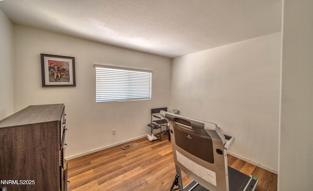 9698 Canyon Meadows Dr, Reno, NV 89506 - workout area with wood finished floors