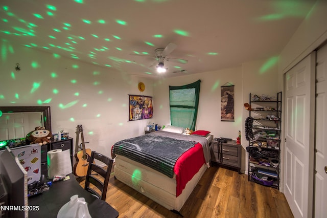 9698 Canyon Meadows Dr, Reno, NV 89506 - bedroom featuring wood finished floors and a ceiling fan