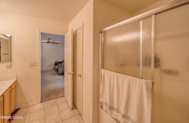 9698 Canyon Meadows Dr, Reno, NV 89506 - full bath with vanity, a shower with shower door, ceiling fan, and tile patterned floors