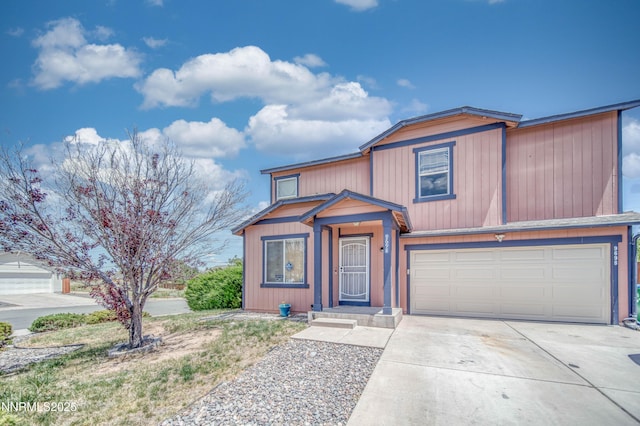 9698 Canyon Meadows Dr, Reno, NV 89506 - view of front facade featuring driveway and an attached garage