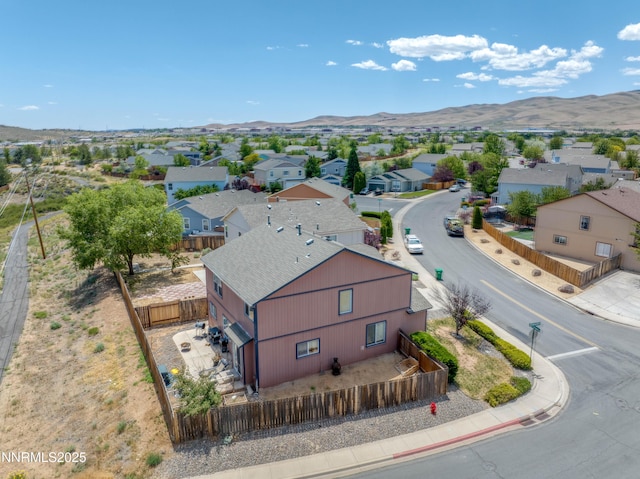 9698 Canyon Meadows Dr, Reno, NV 89506 - aerial perspective of suburban area featuring a mountainous background