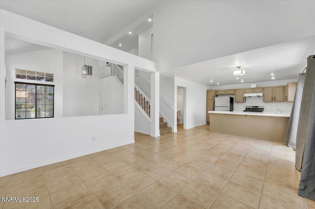 1592 Reno View Dr, Reno, NV 89523 - unfurnished living room with recessed lighting, stairway, high vaulted ceiling, and light tile patterned flooring