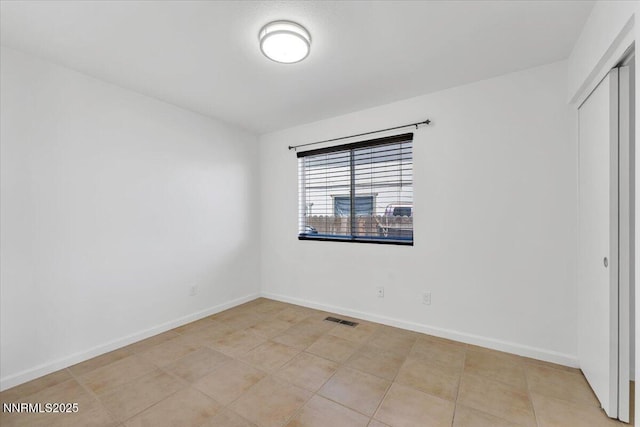1592 Reno View Dr, Reno, NV 89523 - unfurnished bedroom with a closet and light tile patterned floors