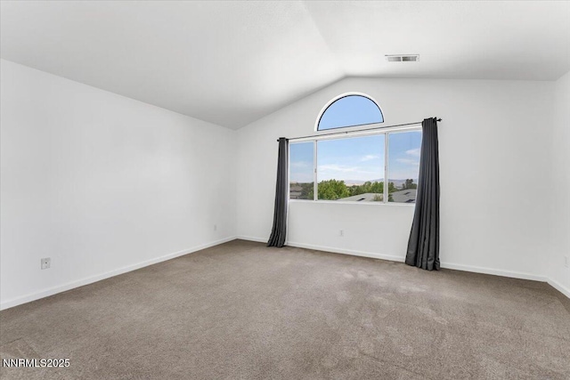 1592 Reno View Dr, Reno, NV 89523 - carpeted empty room featuring vaulted ceiling and baseboards
