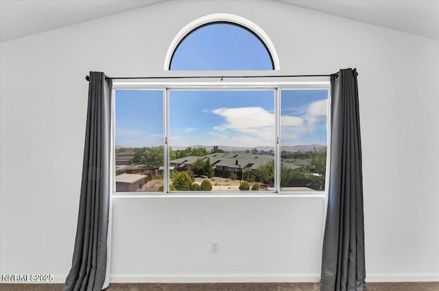 1592 Reno View Dr, Reno, NV 89523 - unfurnished room with lofted ceiling and carpet floors