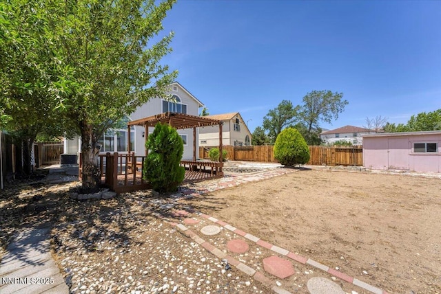1592 Reno View Dr, Reno, NV 89523 - fenced backyard with a pergola and a wooden deck