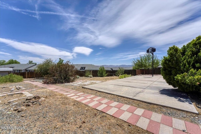 1592 Reno View Dr, Reno, NV 89523 - fenced backyard with a patio area