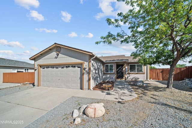 6340 E Choctaw Ct, Sun Valley, NV 89433 - single story home with an attached garage and driveway