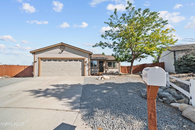 6340 E Choctaw Ct, Sun Valley, NV 89433 - ranch-style house with concrete driveway and a garage