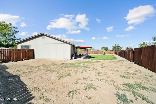 6340 E Choctaw Ct, Sun Valley, NV 89433 - fenced backyard featuring a patio area