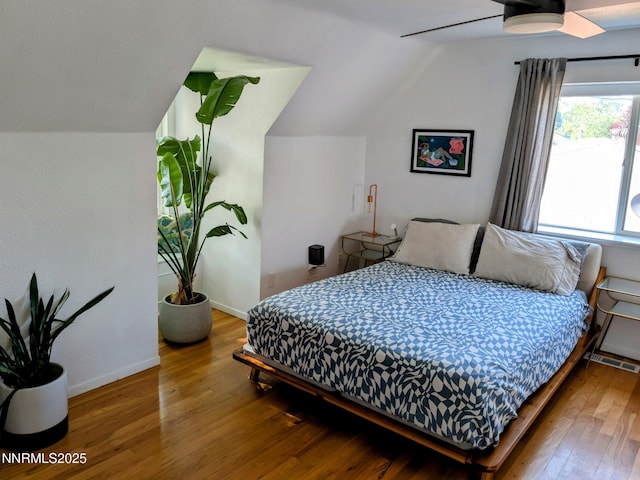 1640 Liston Ave, Reno, NV 89502 - bedroom with hardwood / wood-style floors, lofted ceiling, and a ceiling fan