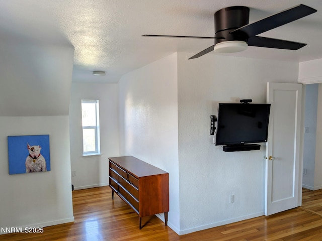 1640 Liston Ave, Reno, NV 89502 - hallway with wood finished floors and a textured ceiling