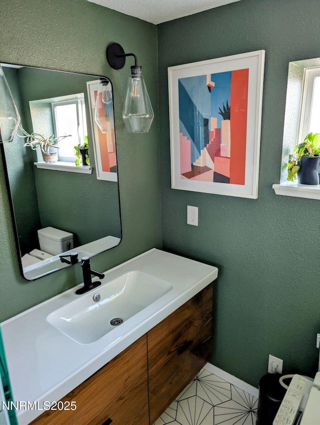 1640 Liston Ave, Reno, NV 89502 - bathroom featuring plenty of natural light, vanity, and tile patterned floors