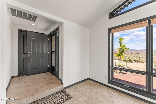 5455 Wild Horse Rd, Reno, NV 89510 - entrance foyer with lofted ceiling and light tile patterned floors