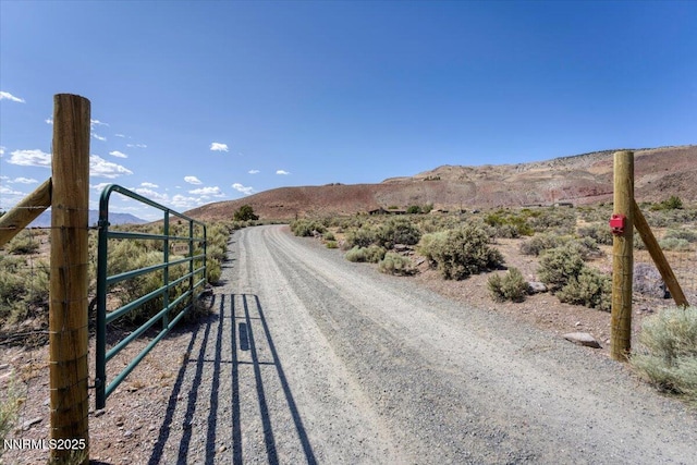 5455 Wild Horse Rd, Reno, NV 89510 - view of street featuring a mountain view and a gated entry