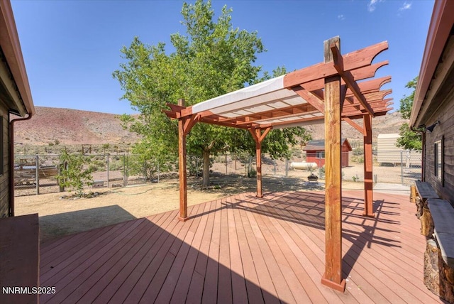 5455 Wild Horse Rd, Reno, NV 89510 - wooden terrace featuring a fenced backyard, a pergola, and a mountain view