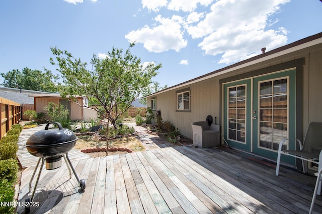13250 Rolling Sage Pl, Reno, NV 89506 - wooden deck featuring french doors and a fenced backyard
