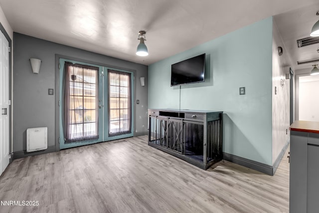 13250 Rolling Sage Pl, Reno, NV 89506 - unfurnished living room with french doors and wood finished floors