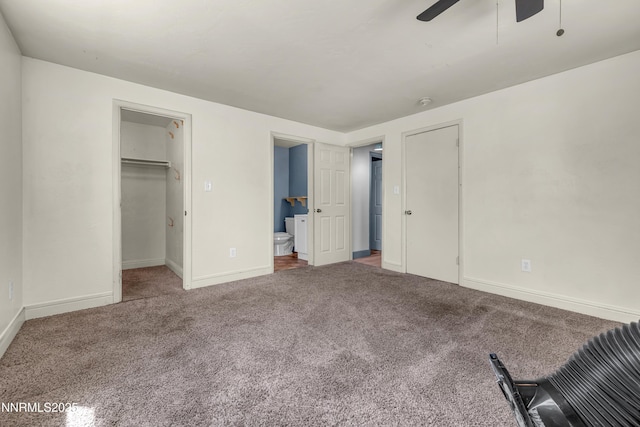 13250 Rolling Sage Pl, Reno, NV 89506 - unfurnished bedroom with carpet flooring, a ceiling fan, ensuite bathroom, and a spacious closet