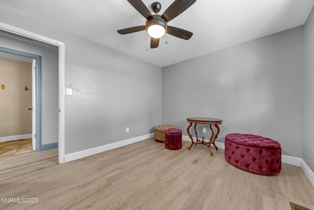 13250 Rolling Sage Pl, Reno, NV 89506 - living area with wood finished floors and a ceiling fan