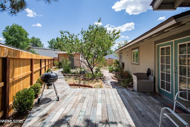 13250 Rolling Sage Pl, Reno, NV 89506 - deck with a fenced backyard and a storage unit