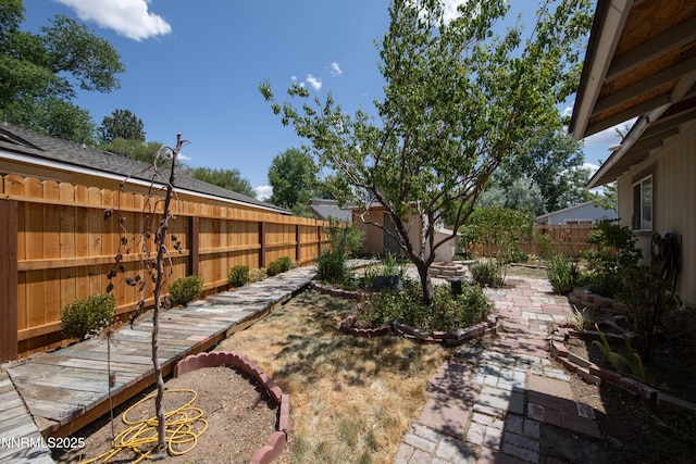 13250 Rolling Sage Pl, Reno, NV 89506 - fenced backyard featuring a patio area