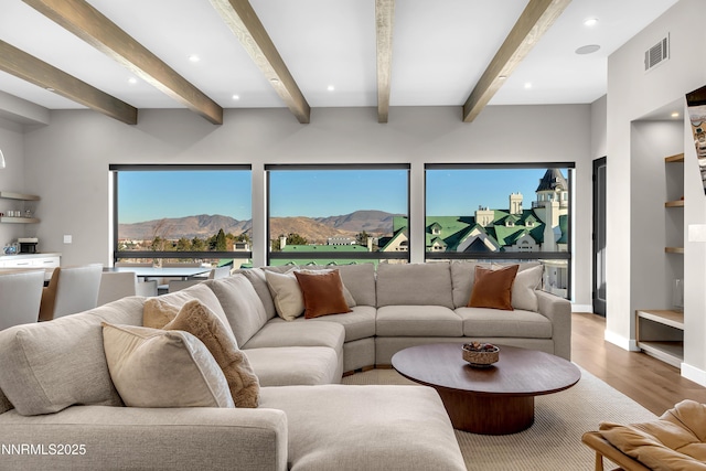 66 Caballada St, Reno, NV 89511 - living room featuring a mountain view, wood finished floors, beamed ceiling, and recessed lighting