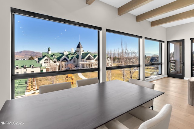 66 Caballada St, Reno, NV 89511 - dining area with beam ceiling, wood finished floors, and healthy amount of natural light