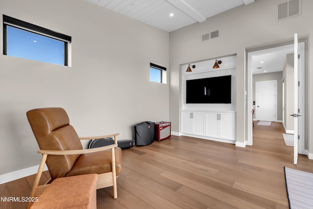66 Caballada St, Reno, NV 89511 - living area featuring light wood-style floors, beam ceiling, and recessed lighting