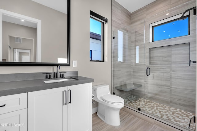66 Caballada St, Reno, NV 89511 - bathroom with healthy amount of natural light, vanity, and a stall shower