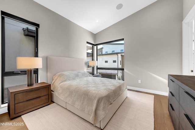 66 Caballada St, Reno, NV 89511 - bedroom with lofted ceiling and wood finished floors
