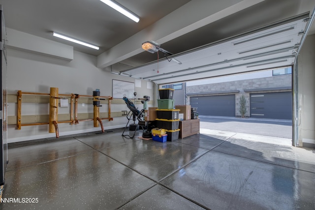 66 Caballada St, Reno, NV 89511 - garage featuring baseboards