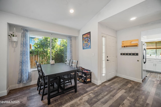 2787 Randolph Dr, Reno, NV 89502 - dining area with dark wood-style flooring, plenty of natural light, recessed lighting, and vaulted ceiling