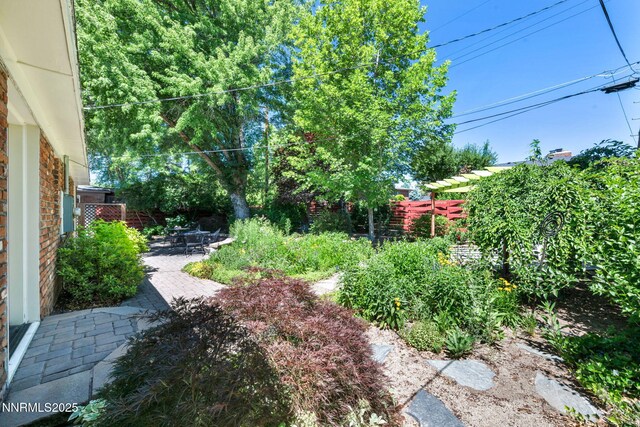 825 W 11th St, Reno, NV 89503 - fenced backyard with a patio area