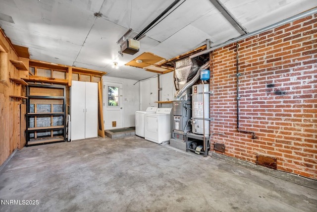 825 W 11th St, Reno, NV 89503 - garage with washer and clothes dryer, strapped water heater, and a garage door opener