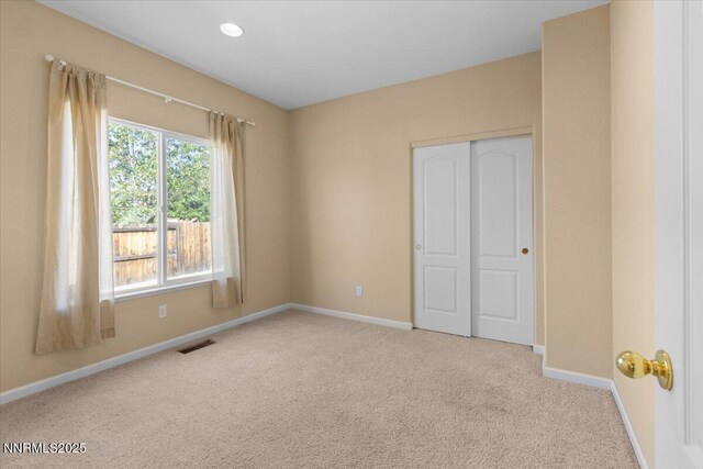 9732 Autumn Leaf Way, Reno, NV 89506 - unfurnished bedroom with carpet and a closet